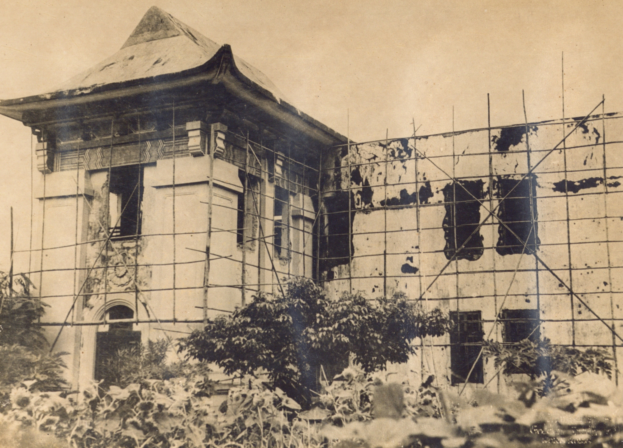 Reception hall, scripture library and living quarters under repair after Japanese Occupation 1945