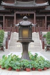 Bronze Buddhist lamp in the centre of Lotus Pond Garden