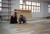 Ven. Wang Fun and Ren Tongchun reviewing the lofting progress of the wood components 